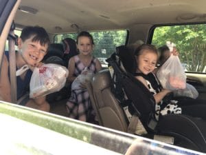 Burke County, GA, students receive food from their school feeding program