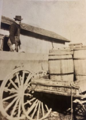 My grandfather working on the family farm