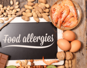 Photo of foods that typically create food allergies - nuts, shellfish, eggs