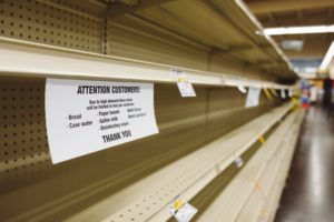 Empty grocery store shelves during a crisis