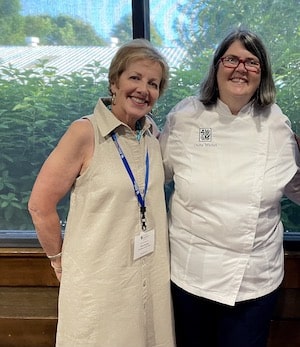 Marianne Smith Edge and Ouita Michel at a University of Kentucky alumni event summer 2022