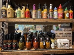 pepper sauces on a shelf in a New York City store