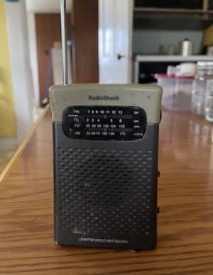 weather radio sitting on a kitchen counter